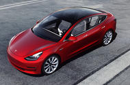 Red Tesla Model 3 press photo