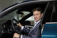 Audi CEO Bram Schott press shot 