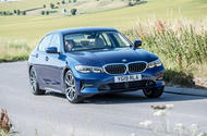 BMW 318d front three quarters on the road