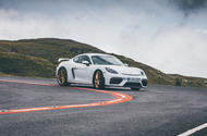 Porsche 718 Cayman GT4 driving - front