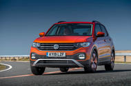 Volkswagen T-Cross front three quarters on the road