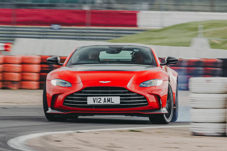 Aston Martin V12 Vantage powersliding on track – front