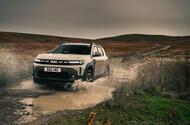 dacia duster review   off roading through a puddle