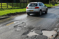 Potholed English road