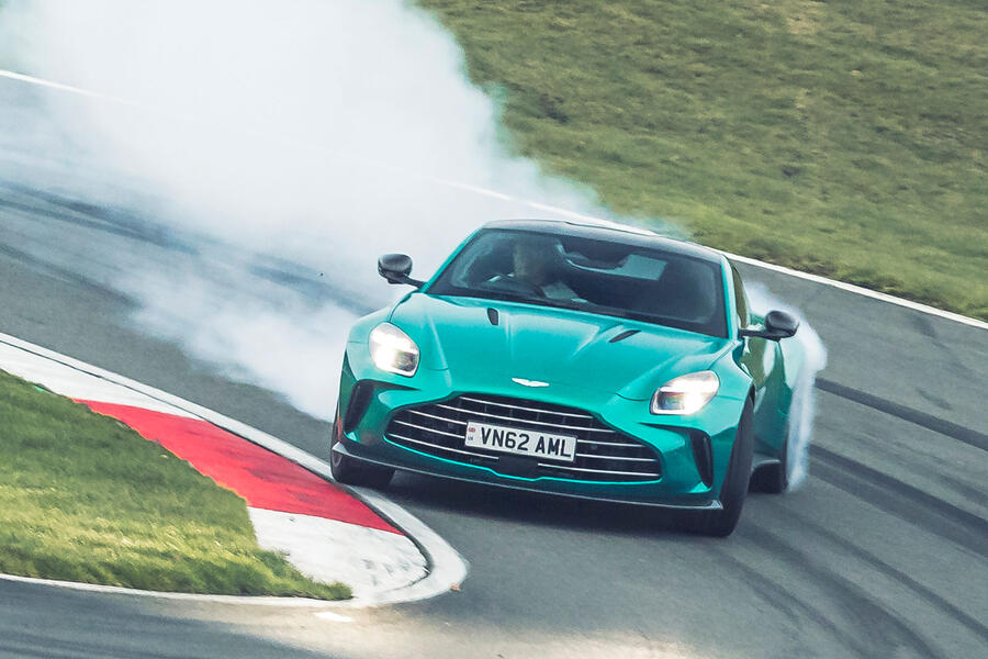 Aston Martin Vantage powersliding, viewed from the front